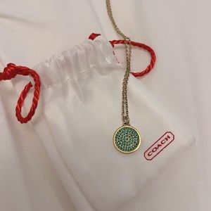 Coach gold with green crystals necklace